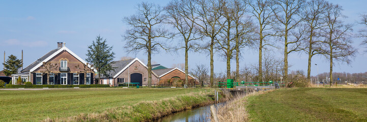 Typical Dutch farmhouse on the countryside