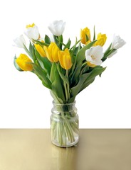 posy of white and yellow tulips close up