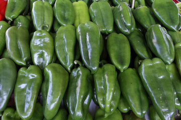 Fresh organic Green peppers. Green peppers background. vegetables pattern. Peppers wallpaper. healthy food concept. Vitamin and antioxidant food. 