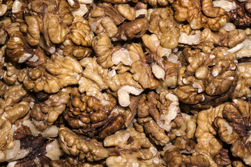 background - peeled ripe walnut kernels closeup..