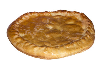 round closed homemade baked pie isolated on white background..