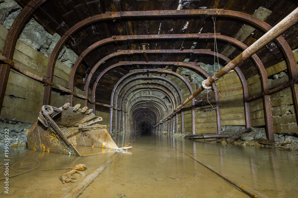 Wall mural Underground old ore gold mine tunnel shaft passage mining technology metal timbering