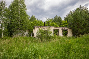 Fototapeta na wymiar Ruins decay of abandoned tungsten ore mine shaft mining technology