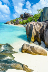 Source d'Argent Beach at island La Digue, Seychelles - Beautifully shaped granite boulders and rock formation - Paradise beach and tropical destination for vacation - obrazy, fototapety, plakaty
