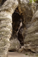 High stone arches in mountains.