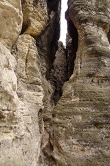 Opening between rock mountain walls.
