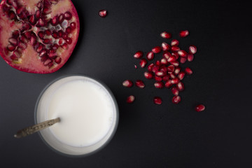 Breakfast with milk and pomegranate