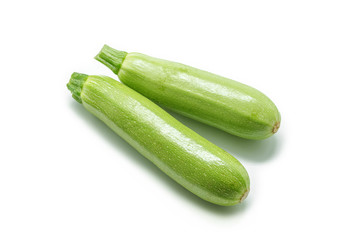Fresh green Zucchini vegetables  isolated on white background.