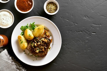 Roasted beef steak with caramelized onion and potato