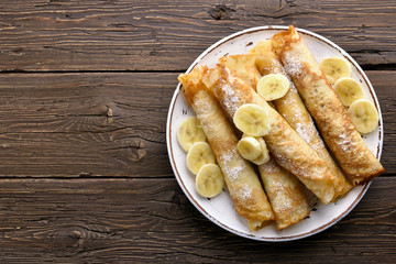 Crepes roll with banana slices