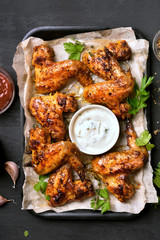Grilled chicken wings with white sauce