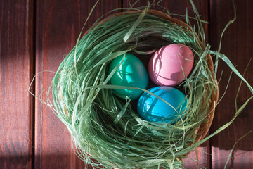 Colorful easter eggs in basket a