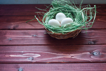 easter eggs in white basket