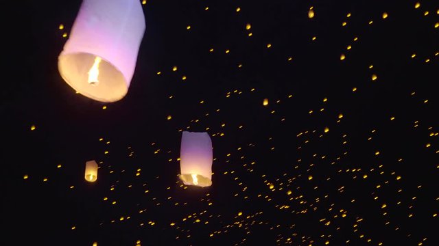 Thousands of sky lanterns are released into the night sky to wish for good luck as part of a lantern festival.
