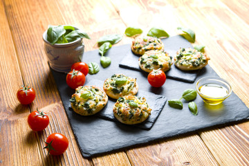 Delicious mini pizza on stone background
