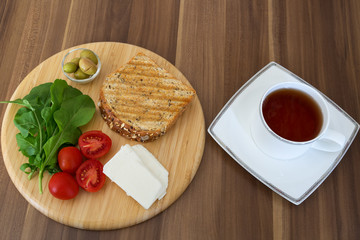 Breakfast concept. Egg, toast, olive and tomatoes on the plate. Tea concept.breakfast at the weekend. Sunday breakfast. healthy food
