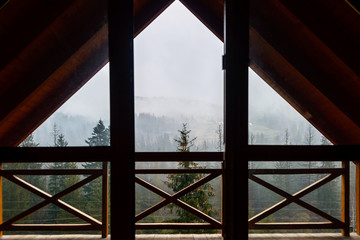 A view of the snow-capped mountains from the attic window.
