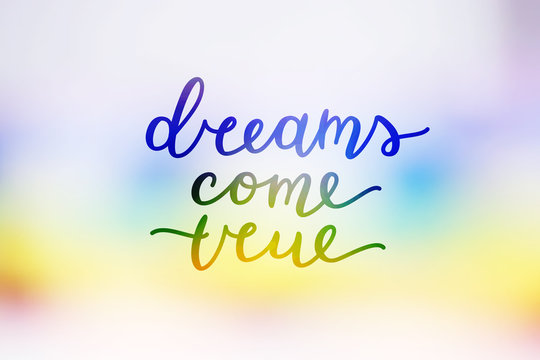 lettering on rainbow blurred background