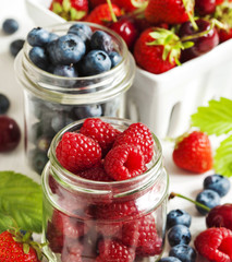 Summer berries in glass jar