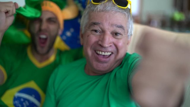 Father and Son Celebrating Brazil Victory