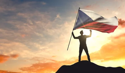 Foto op Canvas Czech Republic flag being waved by a man celebrating success at the top of a mountain. 3D Rendering © ink drop
