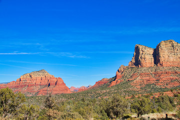 The red rocks of Sedona with plenty of blue sky that can be used as copy space.