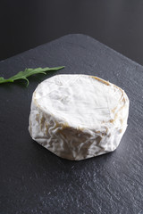 cheese brie stone background black dark