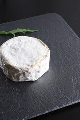 cheese brie stone background black dark