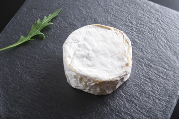 cheese brie stone background black dark