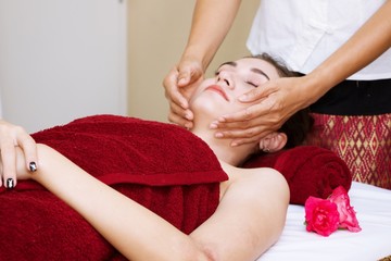 Woman is being massaged in spa