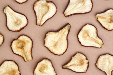 Dried Pears in Pattern on Brown Background