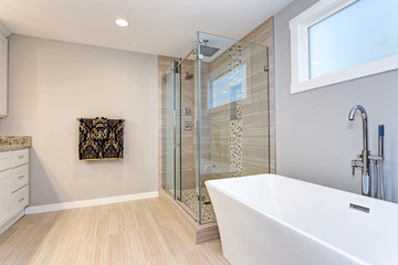 Fototapeta na wymiar Light modern bathroom design with walk in shower