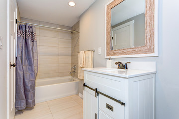 Nice bathroom interior with a vanity cabinet.