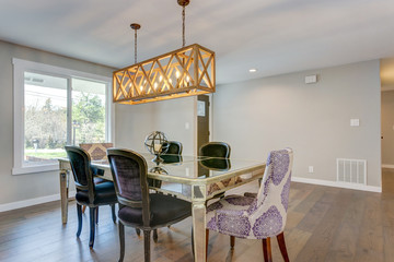 Stunning dining area with mirrored table.