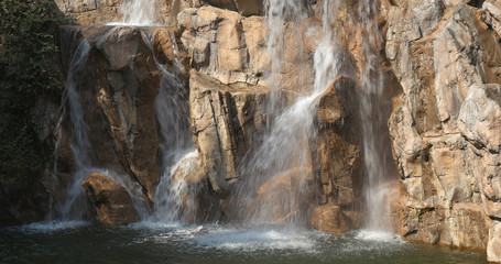 Waterfall with rock and stone