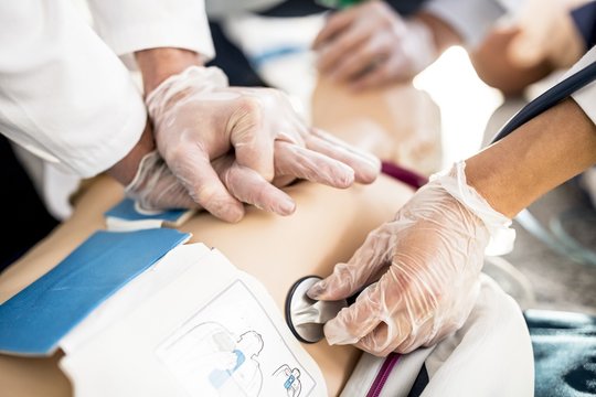 Doctors undertaking CPR training