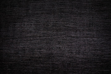 Native pattern on fabric in dark color tone background.