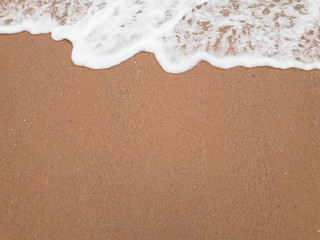 Beach and white sea wave in the top for background.