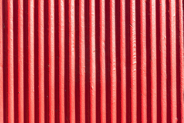 Red corrugated metal sheet background and texture surface