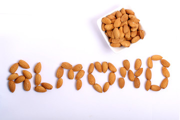Almonds isolated. Group of almond nuts isolated on white background. Full depth of field