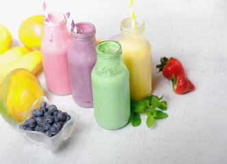 Pastel color fresh smoothie with blueberry, fruits, oats and seeds, selective focus. Clean eating, detox, dieting, vegetarian, vegan, fitness, healthy lifestyle concept, Close-up