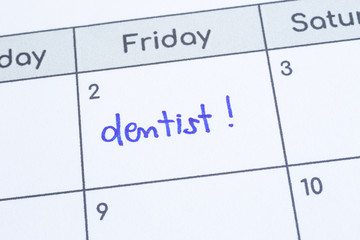The word Dentist written on calendar page.