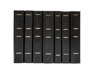 Row of black books isolated on white.