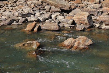 Rocks shaped by water of the Langtang Khola, river in Nepal.