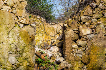Ruins of old abandoned stone house in Figueiro dos Vinhos, Portugal.