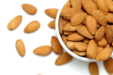 Almonds isolated. Group of almond nuts isolated on white background. Full depth of field