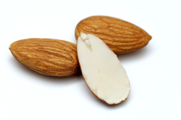 Almonds isolated. Group of almond nuts isolated on white background. Full depth of field