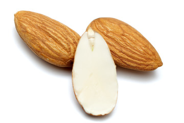 Almonds isolated. Group of almond nuts isolated on white background. Full depth of field