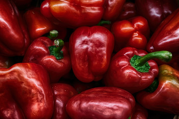 Bright red peppers in store