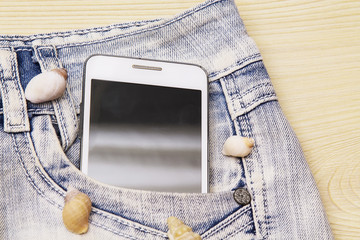 Blue short jeans with mobile phone in your pocket